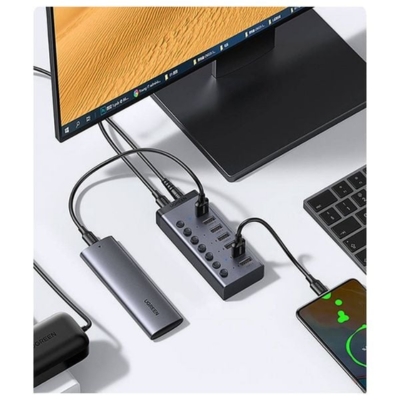 High-performance UGREEN 7-port USB expansion hub ideal for laptops, PCs, and peripherals.