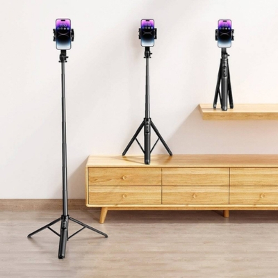 Adjustable UGREEN selfie stick tripod with Bluetooth connectivity for stable recording and travel photography.