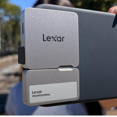 Lexar LSL400S001T-RNSNG Portable Mini SSD with Hub featuring 1TB storage for fast data transfer and device connectivity.